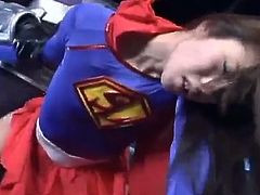 Ren Aizawa is a hot superhero in a Superman suit. Some villain fingers her pussy and then fucks her from behind.