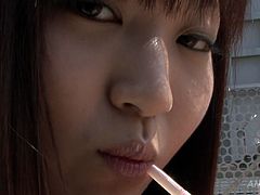 Kinky and filthy bitch with dark hair and nice legs eats a strawberry sexually. Have a look at this slut in Jav HD xxx clip.
