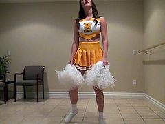 Holly does a dance and shows off her moves to her boyfriend. Her seductive ways really turn him on and before long his dick is bulging out of his jeans. She will take care of that. Look as this cheerleader chick undoes his belt and licks his cock and balls.