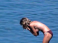 Voyeur loves watching nude babes while they are at the beach