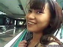 Asian girl strips fully nude in public place