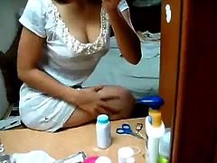 Indian college girl showing cleavage and groping boobs