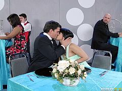 This couple are sitting done for a meal at this wedding and the sexy wife reaches under the table and gives her man a hard and fast handy. He flips her up onto the table and pounds her pussy hole nice and hard with that big throbbing dick of his. What a scene they are causing.