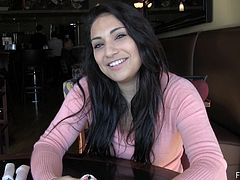Get crazy watching this brunette babe, with natural gazongas anf long hair, while she flashes her best attributes in public at a restaurant.