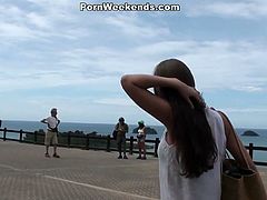 This couple takes a journey to a waterfall where they swim during the day. When the night comes, they do kinky stuff like fucking her doggy style on a chair.