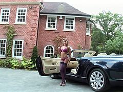 Jenny Laird is one hot blonde who knows how to pose for the camera. She takes off her bra to demonstrate her huge tits. Once she is completely naked she starts rubbing her shaved pussy.