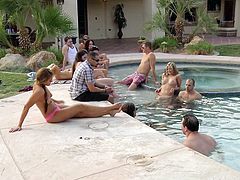 Several young couples get together at a beautiful house. After talking, they're shown outside playing a game on the tennis court. We see the babes showing their breasts, then it's time for some aquatic fun. The girls are shedding their tops again, and you know some hot sex is coming soon.
