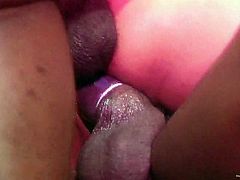 Sexy brunette chick is trying her best to please two black studs. She sucks and rubs their BBCs and then lets the dudes pound her coochie in missionary position.
