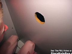This is Aaron's first time to a glory hole. He's ready to suck cock, but for that he gets naked first. Two cocks pop out that glory hole and he sucks them both.