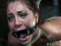 Cici Rhodes tied, gagged and tortured. She struggles feebly against the bondage. The only way she is going anywhere is if Cyd decides to move her, and every time he does she instantly wishes that he would let her go.