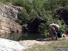 Grandpa Foooki brings you a hell of a free porn video where you can see how this sexy brunette teen slut masturbates outdoors for you while assuming very hot poses.