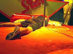 Two hot sluts feeling horny and wishing for a good fuck wake up a sleeping man-whore, having a lot of fun fucking and sucking each other in a threesome action in a noisy club.