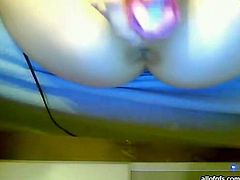 Naughty amateur girl puts big vibrator into her snatch masturbating in front of the camera. She shows her pussy and ass hole in closeup shot.