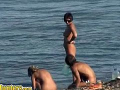 Guys goes in the beach and have a hidden camera on their pockets. They started seeing topless chicks on the place and immediately caught it on cam. They love these nudes especially milfs with huge breasts.