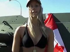 Check out this sexy blonde teenie from Franch having some kinky outdoor fun behind and Army tank. She shows her perfect round tits and fingers her tight pussy.