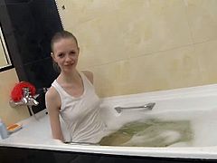 Check out cute teenage babe named Morgan having some soapy fun in the bathroom. Watch as she plays with her beautiful booty and strokes her clit to climax.
