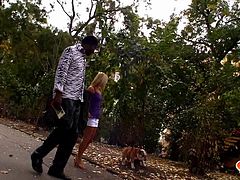 Sabrina is out in the park, walking her pet, when all of a sudden she is approached by a muscular black man. He invites her over to his place and in no time at all, she is sucking his cock, and giving him a footjob. He eats her wet pussy in the bathroom.