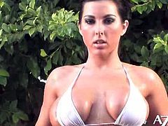 Brianna Jordan looks hot in her bikini, but she looks hotter without! She plays with her pussy by the pool.