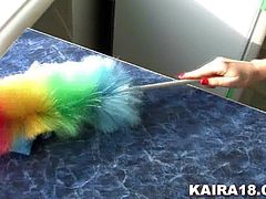 This dirty slut is horny so she takes out her feather duster and rubs it all over her cute body. The dust goes up her knows so she blows a snot rocket. She has a cute rose tattoo and is wearing sexy panties. She even plays with her cunt.