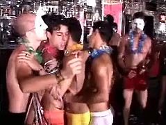 These hot guys strip off their clothes and show off their hot bodies as they dance around this gay club while the music blasts.
