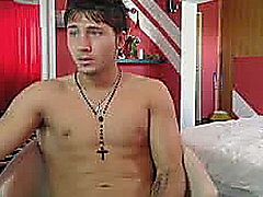 Cute guy doing a hot striptease in front of his cam. He dance and show his nice butt his so hot while wagging his ass and touching his cock while dancing. He put down his brief and started fingering his ass while dancing.