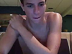 Super cute young twink with a pretty smile jerks his hot cock.