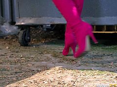 The blonde in the video is chatting with a friend, when a guy approaches her. Click to see Helly wearing pink high heeled boots and a crazy seductive outfit. The milf with big tits expresses her availability by moving her hips sensually. Enjoy watching Helly down on knees pleasing a big cock.