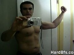 Handsome guy takes his clothes off and poses naked in front of webcam