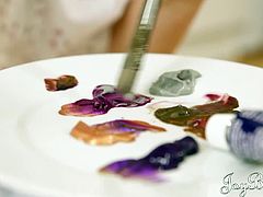 This guy with a huge dick meets a painter babe. She is hot and she has lots of sexy tattoos on her body. She gets pounded and jizzed on her short pussy hair.