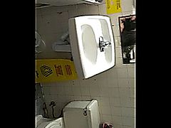 Lucky guy seduced 2 girls into having some sexual fun in the bathroom. These 2 girls suck his cock simultaneously, while the dude captures everything on his cellphone. The blowjob of a lifetime.