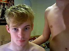 A cute blonde twink and his frat brother experiment with gay blowjobs.