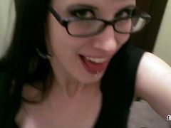 Sexy brunette with piercing and glasses strips in webcam show