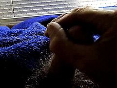 steves cums closeup view in carvan wanking his cock watching porn