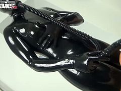 Fun Movies brings you very intense free porn video where you can see how this naughty babe in latex suit dildos a hot blonde's sweet cunt into a massive orgasm.