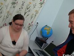 This teacher being naughty wanting to play a game and she picked a daring game of making her fuck one of her young student and here she sucked his big cock and got fucked in her cubicle.