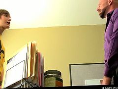 Muscled teacher Mitch takes advantage of desperate student Nick in a cum splashing session