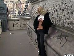 Voluptuous amateur blonde invites us to go to a secluded place in the public and film her as she removes her pants and starts mashing her big tits and fondling her pussy.