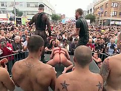 These boys feel good on the stage. Being in the middle of the attention makes them horny as hell and that crowd demands a hot show. They kneel, fuck and feel the magic as an executor humiliates them in front of the public. Damn this is hot so don't miss the rest of it!