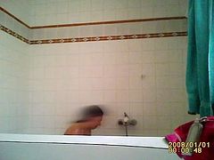 Hidden spy cam gorgeous busty MILF in the shower