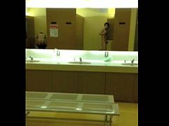 Exhibition wank in public gym