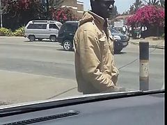 Guy is wanking on the streets
