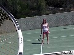 Redhead tennis player showing her smashing tits outdoor