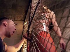 Lovely Asian tranny Jessica has her slave locked in a cage in the dungeon. She sticks her cock in between the chainlinks and makes her male sex slave, sucks her huge shemale cock. Her tight asshole is wrapped firmly around his stiff cock, as she rides him.