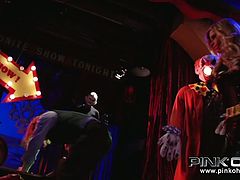 Perverted Joker makes submissive latex beauty suck his strong cock