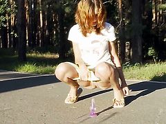 Cute women peeing in the forest