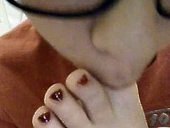 cute teen sucking her toes