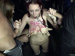 Does humiliating girls in public make you horny? Click to see a naked redhead babe, punished without mercy and disgraced by a fierce mistress, who transforms her into an easy prey for lusty guys. The slutty bitch with big tits gets on knees to suck cocks, while her naughty cunt is fingered deeply...