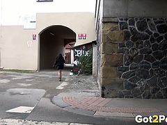 Plump black haired sex doll adores pissing in the yard of her house block