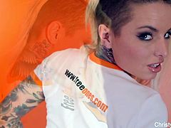 Christy Mack teases the camera in her cute outfit