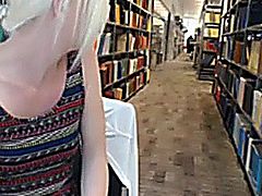 Girl toys her pussy in a public library (creamy)